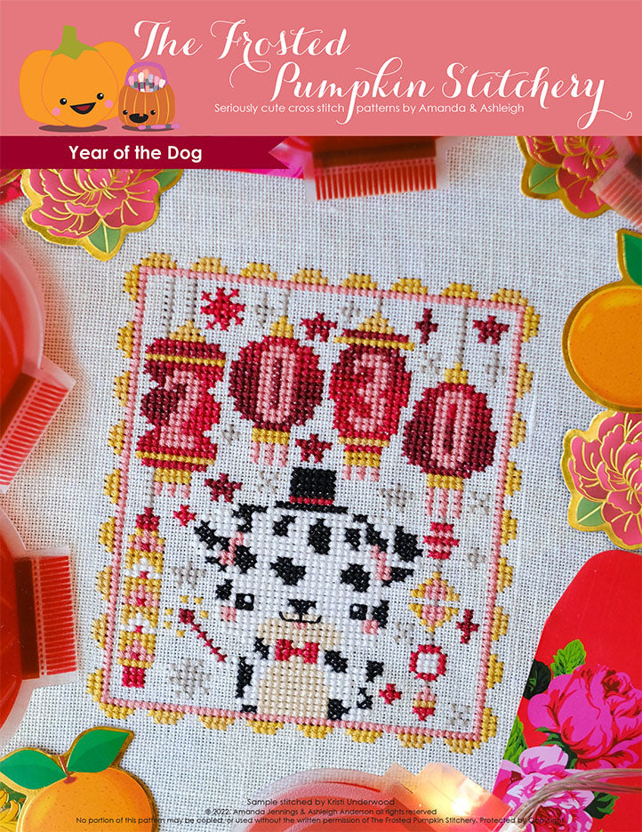 Year of the Dog counted cross stitch pattern. Features a Dalmatian wearing a top hat and holding a sparkler with lanterns that say 2030.