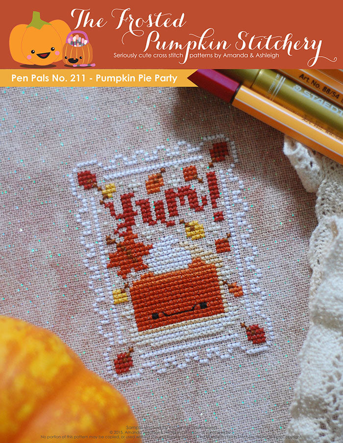 Pen Pals No 211 Pumpkin Pie Party counted cross stitch pattern. A kawaii slice of pumpkin pie on a plate. Surrounded by falling leaves and the word "Yum".