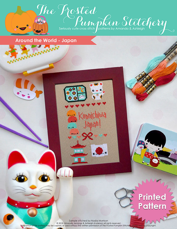 Around the World Japan pattern. Imgae of a lucky cat, embroidery floss, paper sushi and more. Text reads "Konnichiwa Japan."