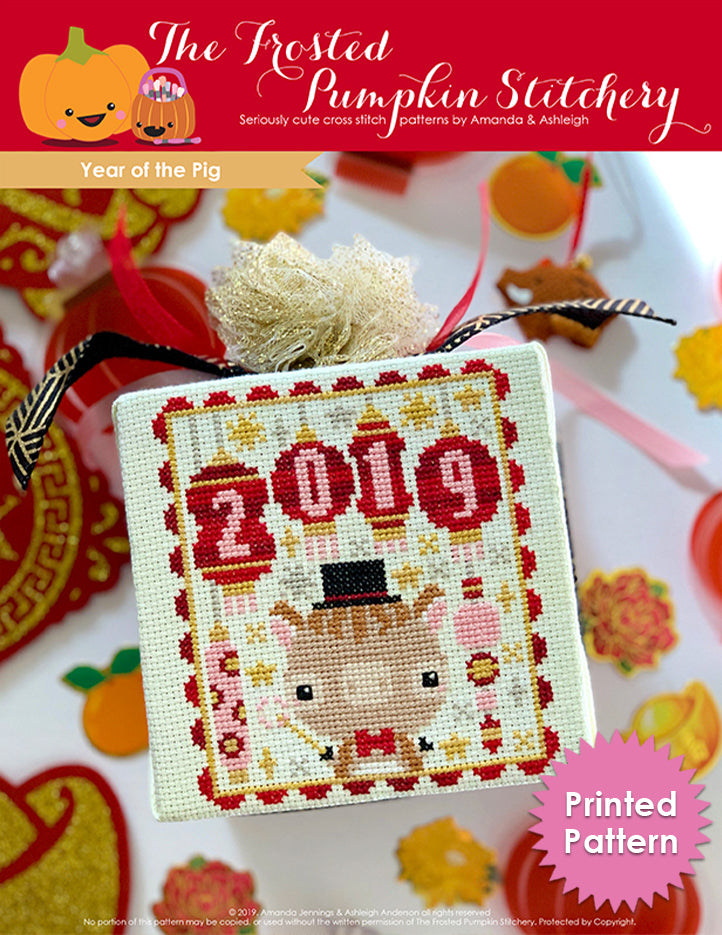Year of the Pig counted cross stitch pattern. A pig wearing a bow tie and a top hat under lanterns that have the numbers 2019 in them. Printed Pattern.
