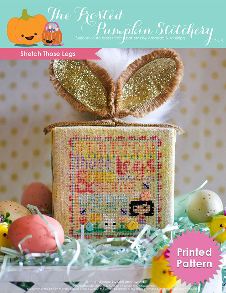 Stretch Those Legs counted cross stitch pattern. An Easter egg hunting little girl with a hat with a button on it is looking for eggs with a bunny. Cube is finished with a bunny tail and ears. Printed Pattern.