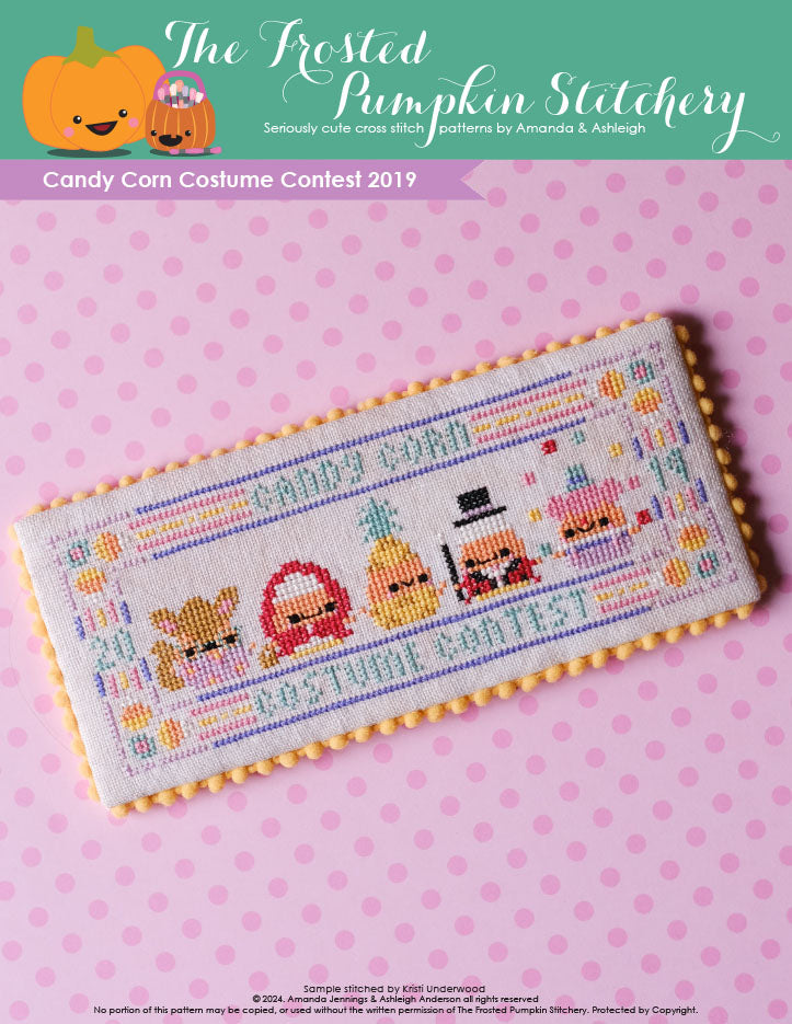 Image of Candy Corn Costume Contest 2019 counted cross stitch pattern. Five little candy corns are in costumes. From left to right they are dressed as the big bad wolf, little red riding hood, a pineapple, a magician and a clown.