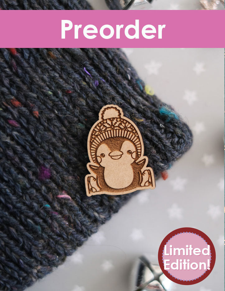 Wooden penguin on a textured fabric background with 'Preorder' and 'Limited Edition!' text.