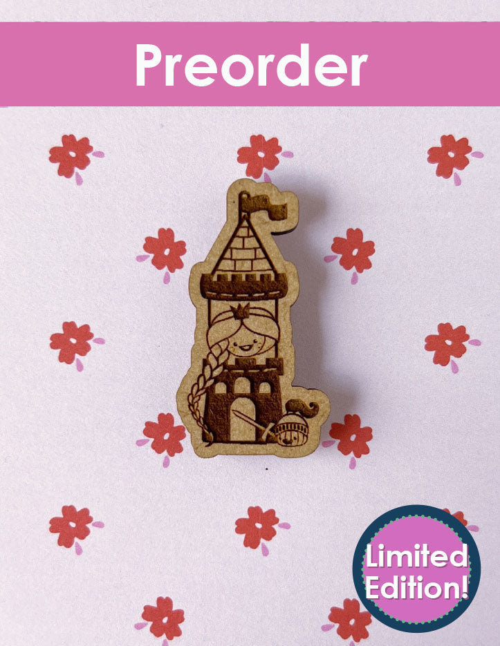 Wooden needleminder with a design of a Jack in a tower on a pink background with flowers and 'Preorder Limited Edition' text.