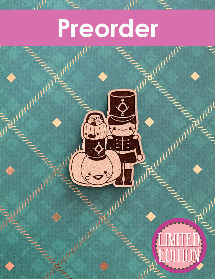 Preorder limited edition needleminder with nutcracker and pumpkin design on a patterned background