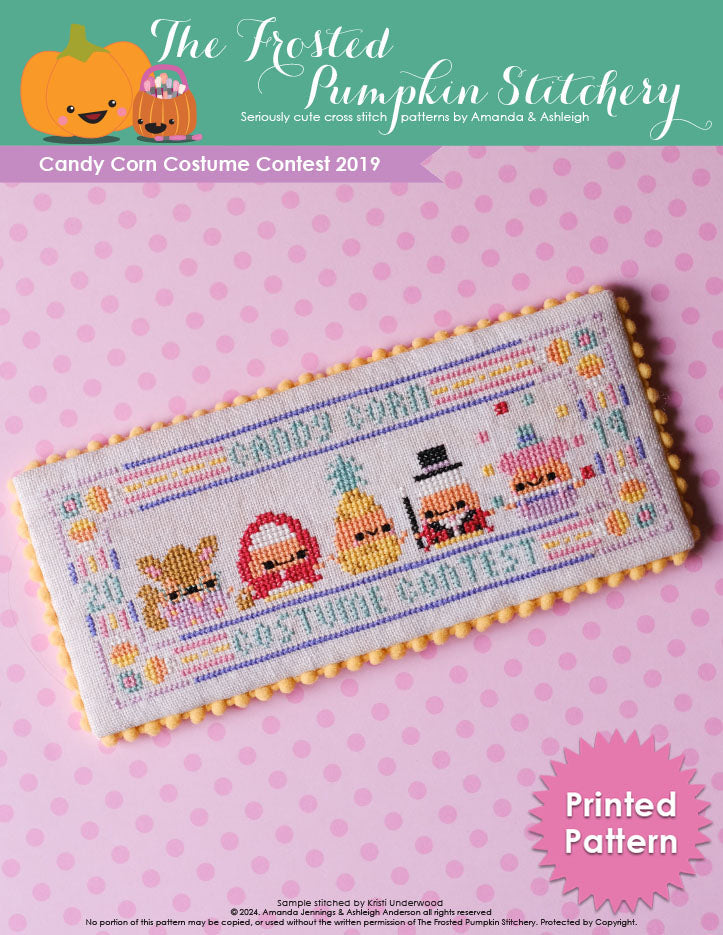 Candy corn costume contest cross stitch pattern. Five candy corns dressed from left to right as a wolf, little red riding hood, a pineapple, a magician and a clown. Text reads "Printed Pattern."
