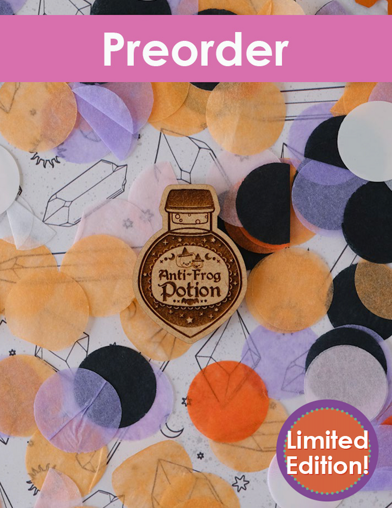 Needleminder for 'Anti-Frog Potion' with colorful circular designs and 'Preorder Limited Edition' text.