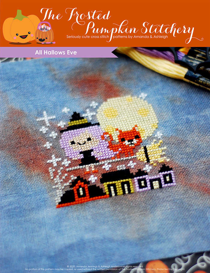 Image of All Hallows Eve Halloween counted cross stitch pattern featuring a purple haired witch on a broom with an orange cat above a village