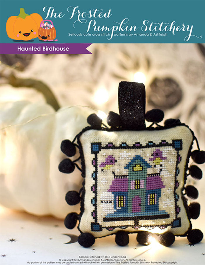 Haunted Birdhouse Halloween counted cross stitch pattern. Purple, blue and teal birdhouse with ghosts and birds flying out.