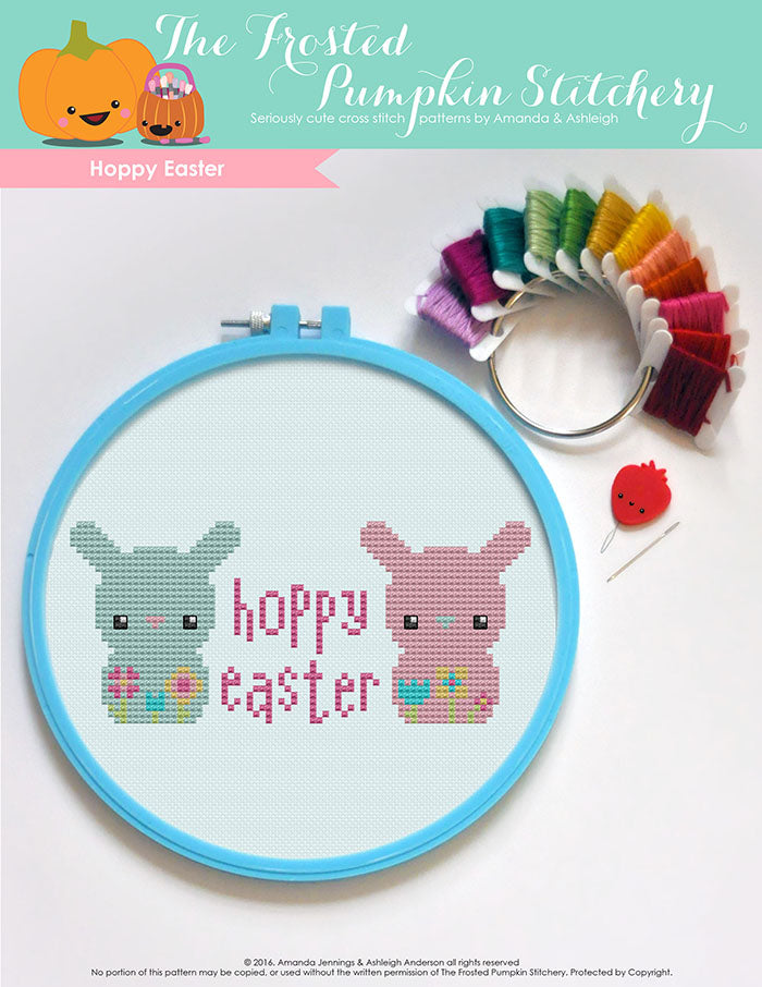 Hoppy Easter counted cross stitch pattern. Two bunnies with the text "Hoppy Easter" in between them.