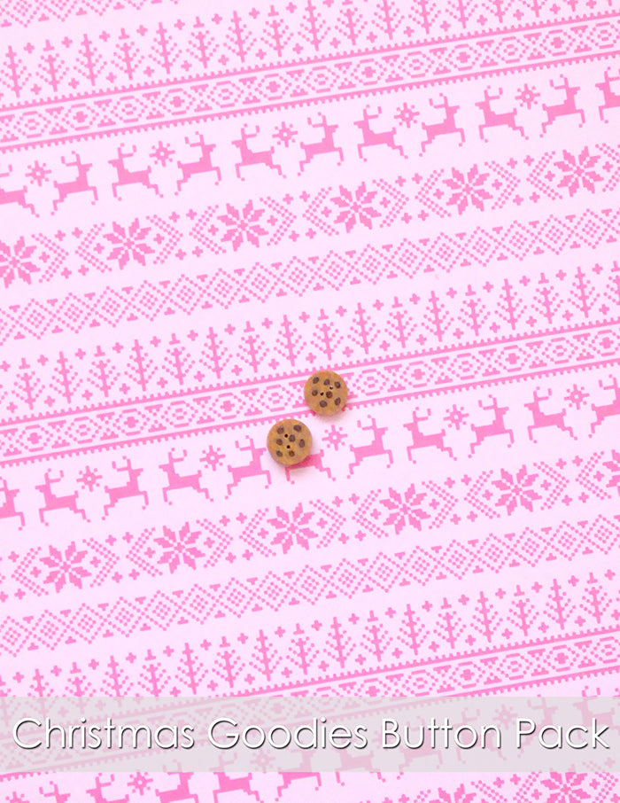 Christmas Goodies Button Pack. Two tiny chocolate chip cookie polymer clay buttons are on a reindeer printed pink background.
