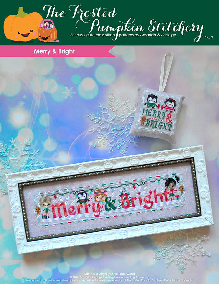 Merry and Bright counted cross stitch pattern. Three friends are decorating for the holidays with some penguins. One piece is in a white frame and the other is a scissor fob.