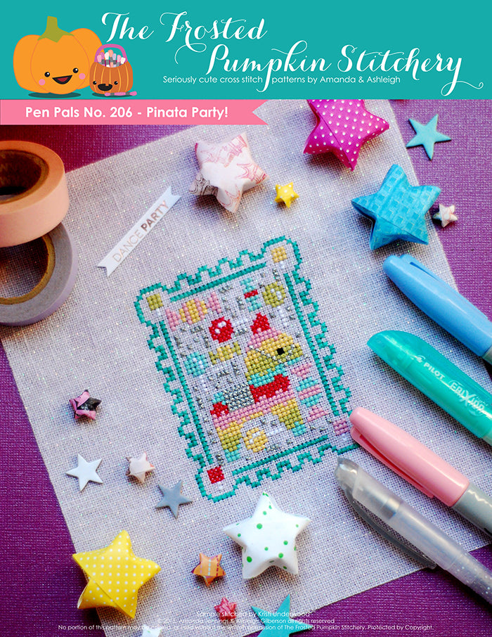 Pen Pals No 206 Pinata Party counted cross stitch pattern. A rainbow colored pinata surrounded by candy.