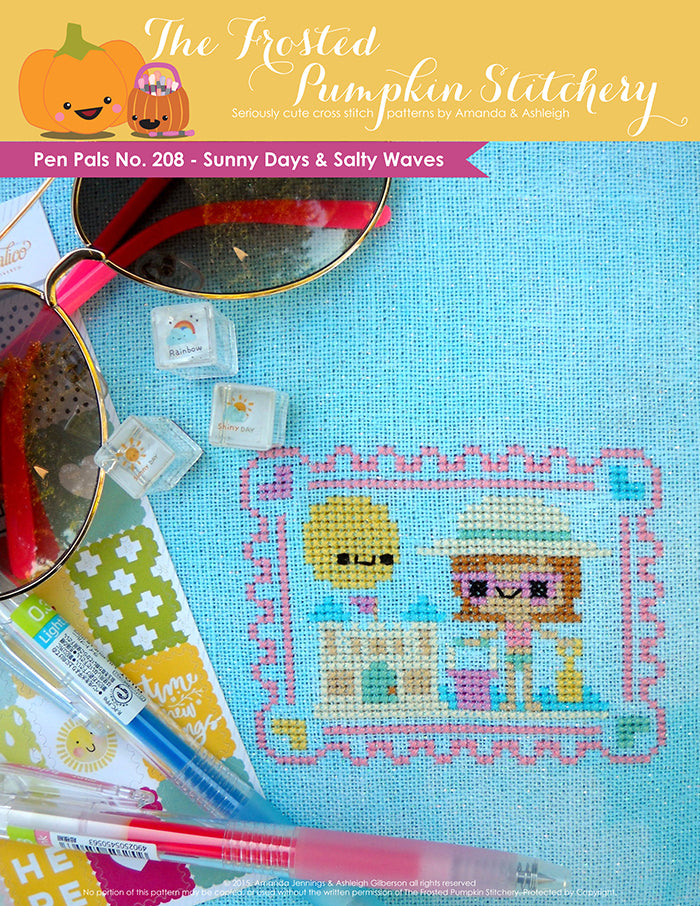 Pen Pals No 208 Sunny Days and Salty Waves counted cross stitch pattern. A girl with pale skin, pink sunglasses and a sun hat is building a sandcastle.