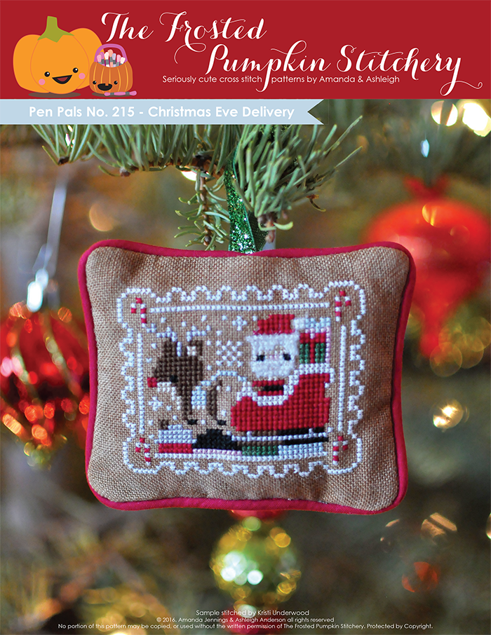 Pen Pals No 215 Christmas Eve Delivery counted cross stitch pattern. Santa and Rudolph fly over a village on Christmas Eve.