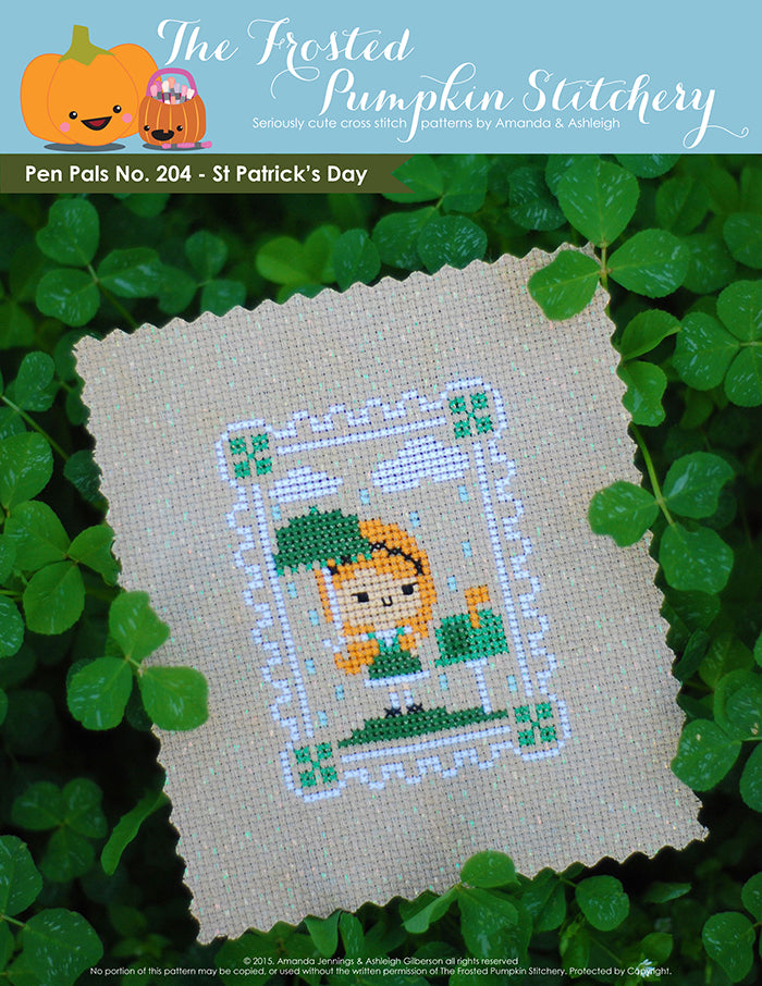 Pen Pals No 204 St Patrick's Day counted cross stitch pattern. A pale girl with red hair stands under a green umbrella next to a mailbox.