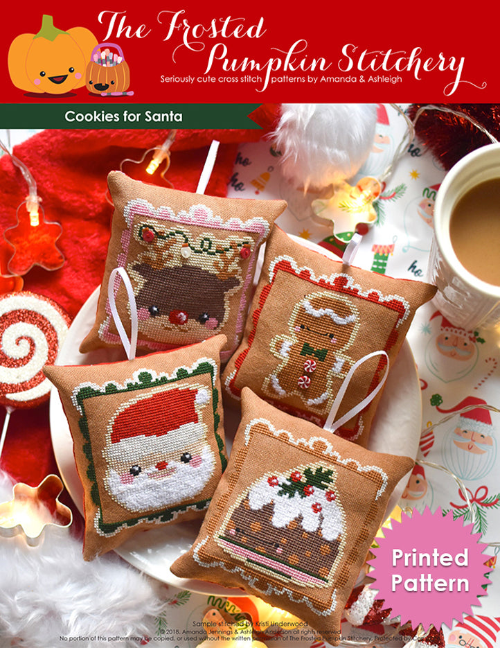 Cookies for Santa counted cross stitch pattern. Four gingerbread cookie inspired Christmas ornaments stitched on gingerbread colored fabric and turned into ornaments. Ornaments are Rudolph, Gingerbreadman, Figgy Pudding and Santa. Text reads "Printed Pattern."