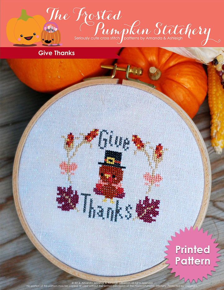 Give Thanks counted cross stitch pattern. A little Thanksgiving turkey wearing a hat surrounded by leaves and the text says "Give Thanks". Printed Pattern.