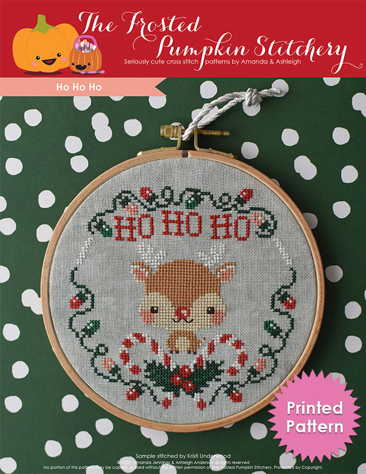 Ho Ho Ho counted cross stitch pattern. Image of Rudolph the Red Nosed Reindeer surrounded by Christmas lights, candy canes and holly. Printed Pattern.