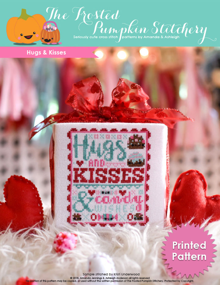 Hugs and Kisses counted cross stitch pattern. Text reads "Hugs and Kisses and Candy Wishes". Printed Chart.