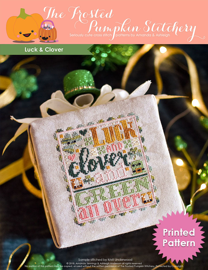 Luck and Clover counted cross stitch pattern. St. Patrick's Day inspired with pinks, golds, dark and light green. Text reads "Luck and Clover and Green All Over". Printed Pattern.