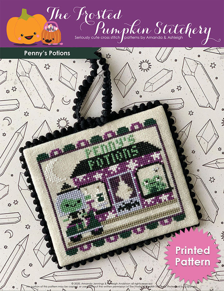Image of Penny's Potions Cross Stitch Pattern. Penny the silver haired witch is riding a green scooter on her way to her shop called Penny's Potions. Her shop features potion bottles and a frog trying to catch fly in the windows along with a bat on the front door. Printed Pattern.
