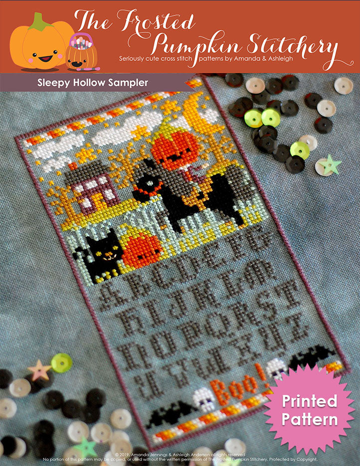 Sleepy Hollow Sampler counted cross stitch pattern. The headless horsemen is riding in the village at night. Alphabet below in a Halloween inspired font. Printed Pattern.