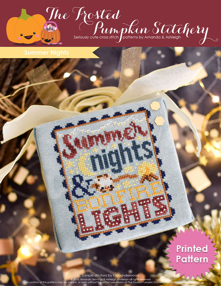 Summer Nights Counted Cross Stitch Pattern. Image of a cross stitch pattern with text that says "summer nights and bonfire lights". There is a marshmallow on a stick and a bonfire in the pattern. Printed Pattern.