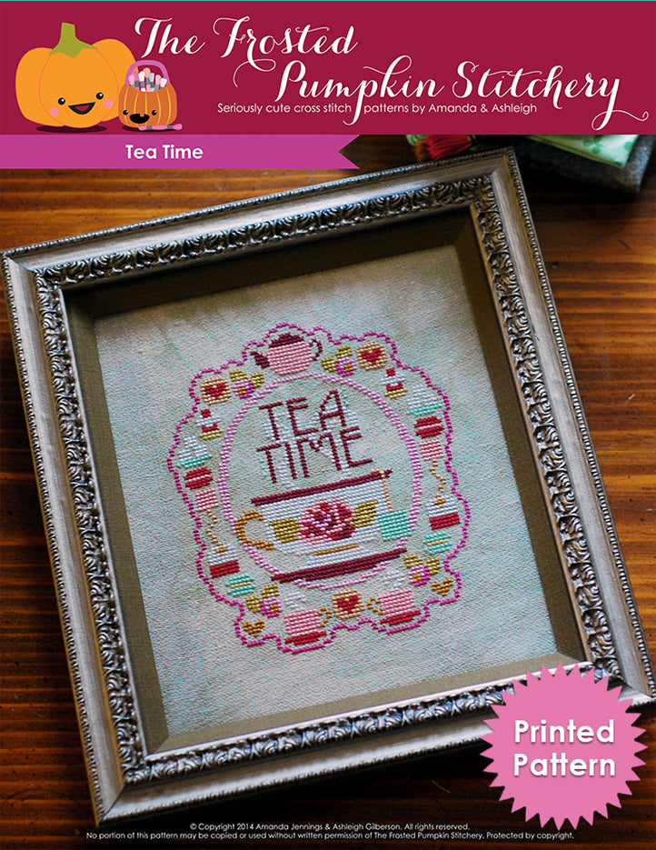 Tea Time counted cross stitch pattern. A cup of tea with a tea bag, surrounded by various tea time treats such as sugar cubes, macarons and biscuits. Printed Pattern.