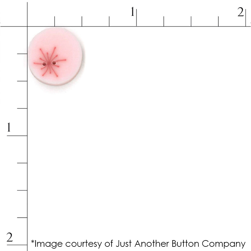 Pink button from Just Another Button Company for scale. Measures approximately half of an inch.