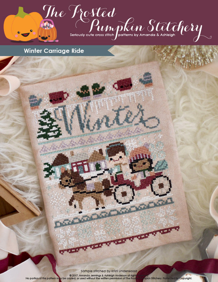 Winter Carriage Ride counted cross stitch pattern. A horse drawn carriage with a man with fair skin and medium brown hair and a woman with light brown skin and dark hair. She's wearing a peach colored hat, he's wearing ear muffs.