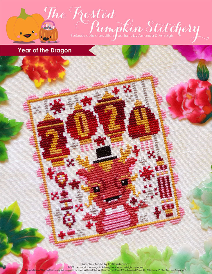 Year of the Dragon counted cross stitch pattern. A dragon wearing a top hat and holding a sparkler with lanterns that say 2024.