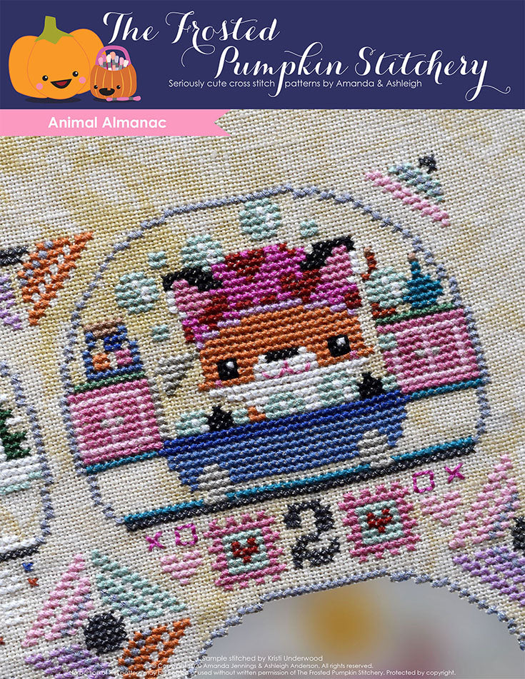 Animal Almanac Cross Stitch Pattern Cover. Image of a fox in the bath tub surrounded by bubbles, stamps and a number 2.