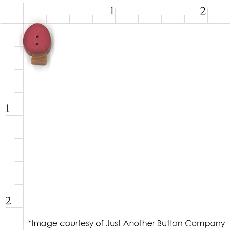 Close up scale of a red Christmas light bulb  button from Just Another Button Company